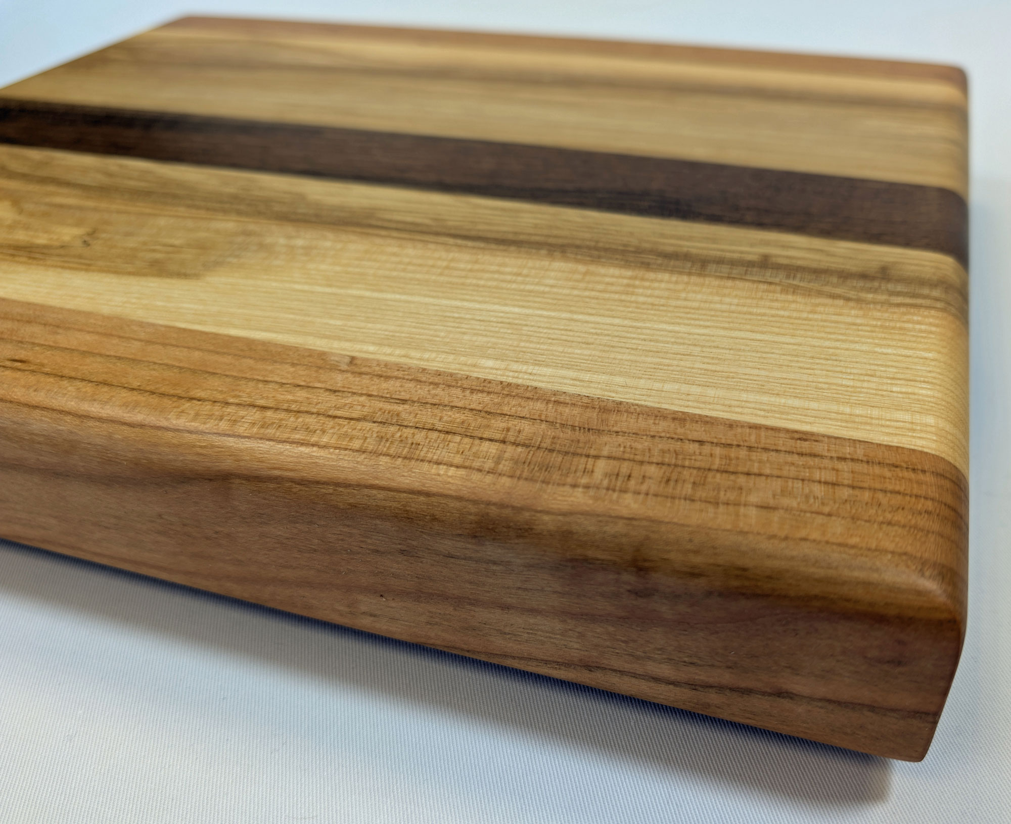 Schneidebrett Esche - Nussbaum - Kirsche 345 x 285 x 45 mm