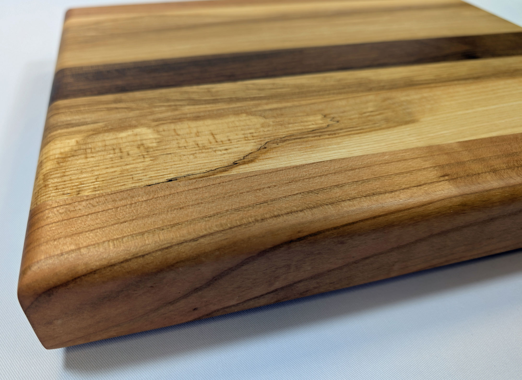 Schneidebrett Esche - Nussbaum - Kirsche 345 x 285 x 45 mm