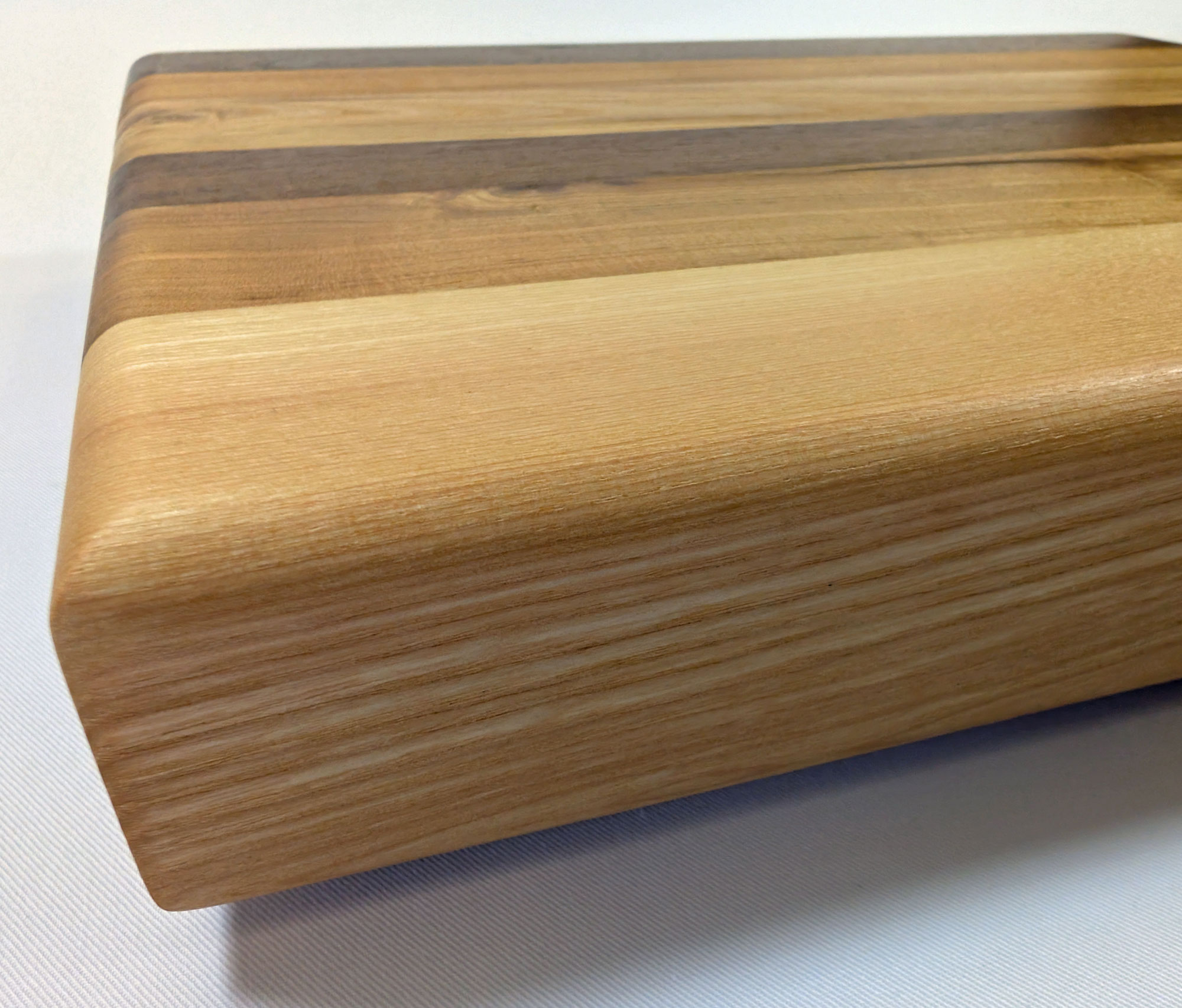 Schneidebrett Kirsche - Nussbaum - Esche 320 x 260 x 50 mm