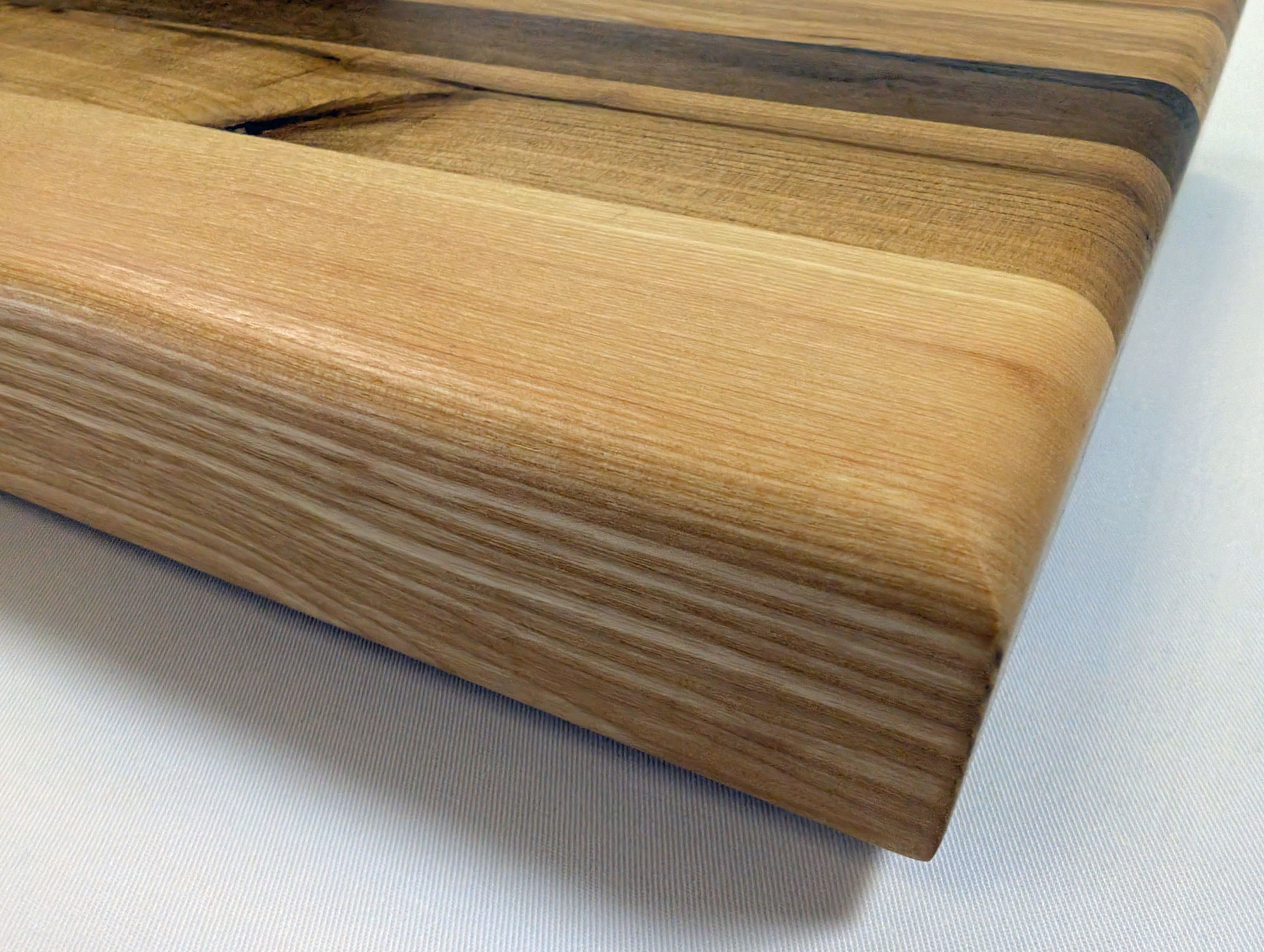 Schneidebrett Kirsche - Nussbaum - Esche 320 x 260 x 50 mm
